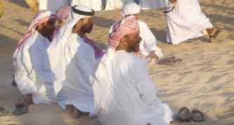 Arabs sitting in the desert